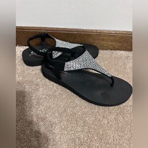 Cali from Sketchers Yoga Foam Women's Black Sandals with Silver Accents